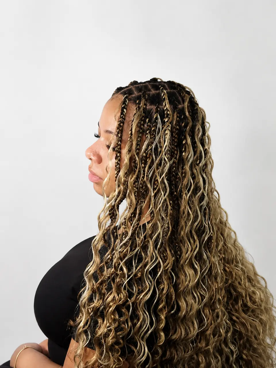 Highlighted boho braids with long curls